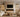 Econovex 1800 3-sided electric fire in a travertine chimney breast