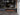 Econovex B174 74 inch insert electric fire in a floating media wall cabinet under a TV