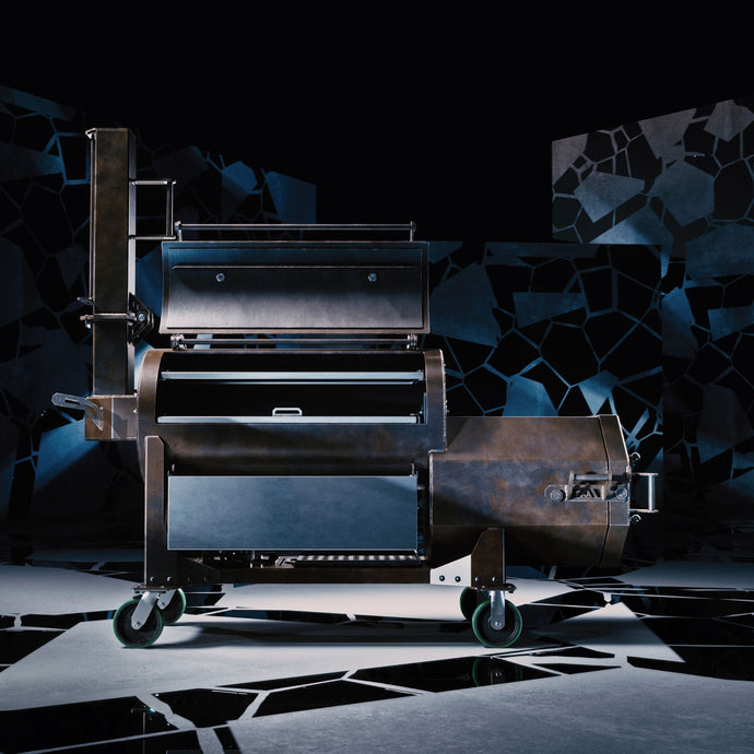 Fractal 90 offset smoker with lid open, revealing spacious cook chamber and heavy-duty grates.